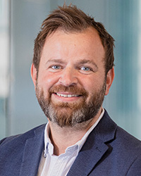 Porträttbild på Oliver Hagvall